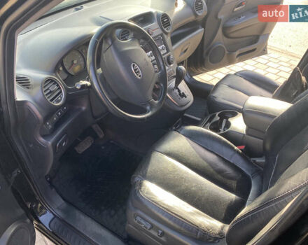 Чорний Кіа Каренс, об'ємом двигуна 2 л та пробігом 229 тис. км за 6900 $, фото 13 на Automoto.ua