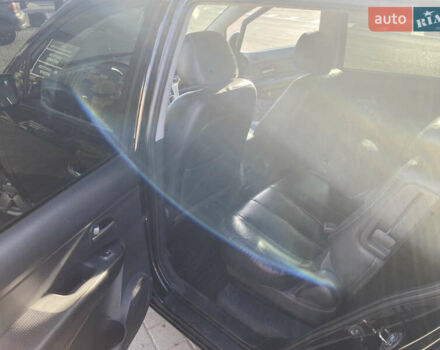 Чорний Кіа Каренс, об'ємом двигуна 2 л та пробігом 229 тис. км за 6900 $, фото 12 на Automoto.ua