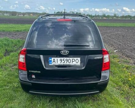 Черный Киа Каренс, объемом двигателя 2 л и пробегом 296 тыс. км за 7100 $, фото 23 на Automoto.ua