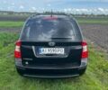 Черный Киа Каренс, объемом двигателя 2 л и пробегом 296 тыс. км за 7100 $, фото 23 на Automoto.ua
