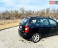 Черный Киа Каренс, объемом двигателя 1.99 л и пробегом 238 тыс. км за 5600 $, фото 7 на Automoto.ua