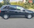 Черный Киа Каренс, объемом двигателя 2 л и пробегом 354 тыс. км за 5000 $, фото 1 на Automoto.ua