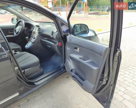 Чорний Кіа Каренс, об'ємом двигуна 2 л та пробігом 191 тис. км за 6500 $, фото 41 на Automoto.ua