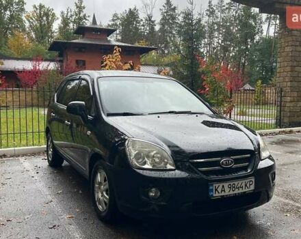 Чорний Кіа Каренс, об'ємом двигуна 2 л та пробігом 207 тис. км за 6500 $, фото 1 на Automoto.ua