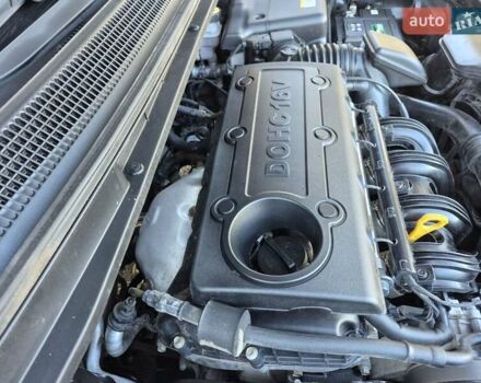 Чорний Кіа Каренс, об'ємом двигуна 2 л та пробігом 88 тис. км за 6450 $, фото 55 на Automoto.ua