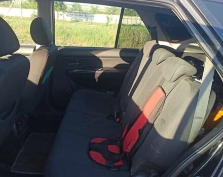 Чорний Кіа Каренс, об'ємом двигуна 2 л та пробігом 234 тис. км за 5500 $, фото 12 на Automoto.ua