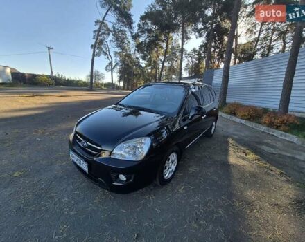 Чорний Кіа Каренс, об'ємом двигуна 2 л та пробігом 88 тис. км за 6450 $, фото 28 на Automoto.ua