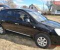 Чорний Кіа Каренс, об'ємом двигуна 2 л та пробігом 400 тис. км за 5700 $, фото 1 на Automoto.ua