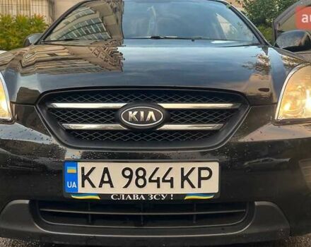 Чорний Кіа Каренс, об'ємом двигуна 2 л та пробігом 207 тис. км за 6500 $, фото 9 на Automoto.ua