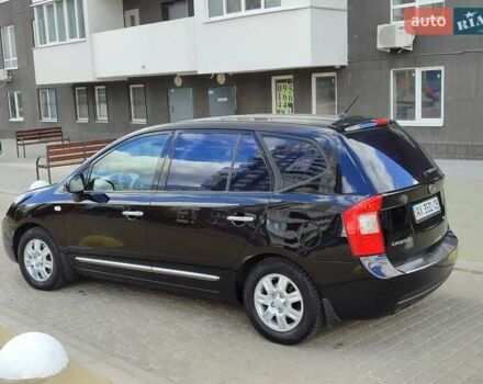 Чорний Кіа Каренс, об'ємом двигуна 2 л та пробігом 191 тис. км за 6500 $, фото 12 на Automoto.ua