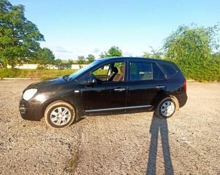 Чорний Кіа Каренс, об'ємом двигуна 2 л та пробігом 234 тис. км за 5500 $, фото 14 на Automoto.ua