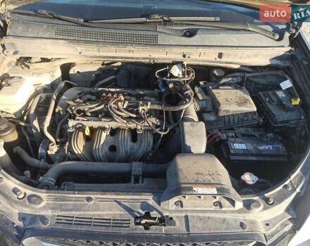 Чорний Кіа Каренс, об'ємом двигуна 2 л та пробігом 234 тис. км за 5500 $, фото 2 на Automoto.ua