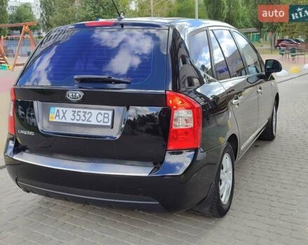 Чорний Кіа Каренс, об'ємом двигуна 2 л та пробігом 191 тис. км за 6500 $, фото 25 на Automoto.ua
