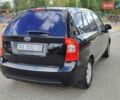 Чорний Кіа Каренс, об'ємом двигуна 2 л та пробігом 191 тис. км за 6500 $, фото 25 на Automoto.ua
