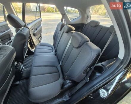 Чорний Кіа Каренс, об'ємом двигуна 2 л та пробігом 88 тис. км за 6450 $, фото 58 на Automoto.ua
