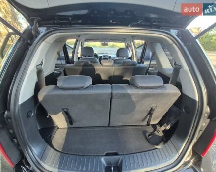 Чорний Кіа Каренс, об'ємом двигуна 2 л та пробігом 88 тис. км за 6450 $, фото 57 на Automoto.ua