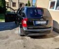 Черный Киа Каренс, объемом двигателя 2 л и пробегом 265 тыс. км за 5500 $, фото 5 на Automoto.ua