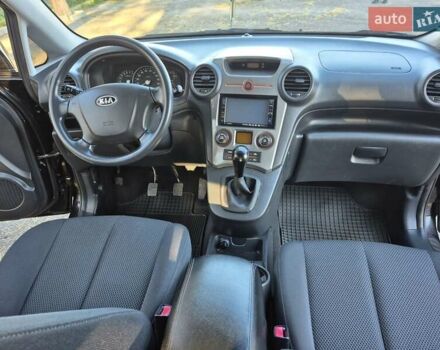 Чорний Кіа Каренс, об'ємом двигуна 2 л та пробігом 88 тис. км за 6450 $, фото 43 на Automoto.ua