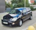Чорний Кіа Каренс, об'ємом двигуна 2 л та пробігом 191 тис. км за 6500 $, фото 18 на Automoto.ua
