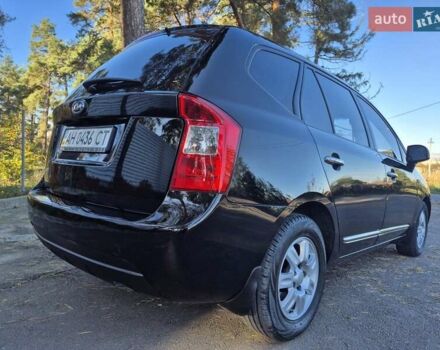 Чорний Кіа Каренс, об'ємом двигуна 2 л та пробігом 88 тис. км за 6450 $, фото 18 на Automoto.ua