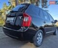 Чорний Кіа Каренс, об'ємом двигуна 2 л та пробігом 88 тис. км за 6450 $, фото 18 на Automoto.ua