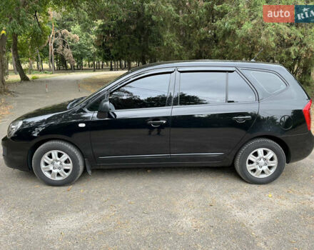 Кіа Каренс 2008 у Харкові на Automoto.ua Чорний Кіа Каренс, об'ємом двигуна 2 л та пробігом 207 тис. км за 7000 $, фото 8 на Automoto.ua