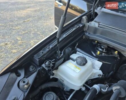 Чорний Кіа Каренс, об'ємом двигуна 2 л та пробігом 88 тис. км за 6450 $, фото 54 на Automoto.ua