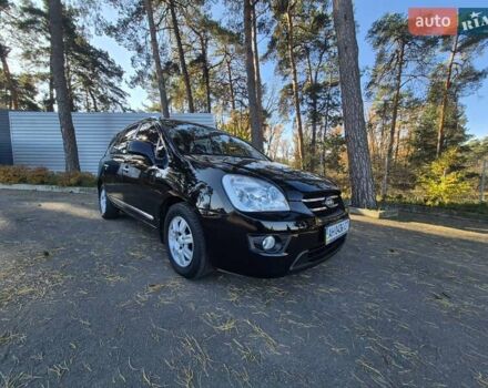 Чорний Кіа Каренс, об'ємом двигуна 2 л та пробігом 88 тис. км за 6450 $, фото 30 на Automoto.ua