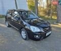 Чорний Кіа Каренс, об'ємом двигуна 2 л та пробігом 88 тис. км за 6450 $, фото 33 на Automoto.ua