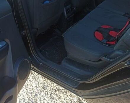 Чорний Кіа Каренс, об'ємом двигуна 2 л та пробігом 234 тис. км за 5500 $, фото 10 на Automoto.ua