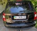Черный Киа Каренс, объемом двигателя 2 л и пробегом 99 тыс. км за 5500 $, фото 1 на Automoto.ua