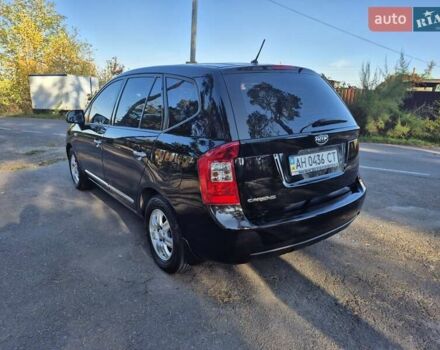 Чорний Кіа Каренс, об'ємом двигуна 2 л та пробігом 88 тис. км за 6450 $, фото 1 на Automoto.ua