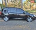 Чорний Кіа Каренс, об'ємом двигуна 2 л та пробігом 88 тис. км за 6450 $, фото 14 на Automoto.ua
