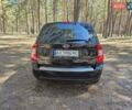 Черный Киа Каренс, объемом двигателя 2 л и пробегом 195 тыс. км за 5700 $, фото 1 на Automoto.ua