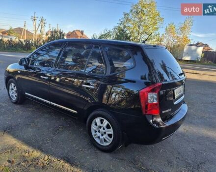 Чорний Кіа Каренс, об'ємом двигуна 2 л та пробігом 88 тис. км за 6450 $, фото 24 на Automoto.ua