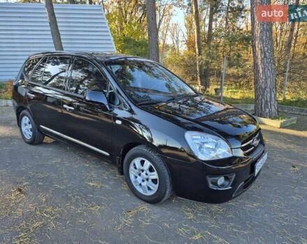 Чорний Кіа Каренс, об'ємом двигуна 2 л та пробігом 88 тис. км за 6450 $, фото 16 на Automoto.ua