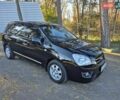 Чорний Кіа Каренс, об'ємом двигуна 2 л та пробігом 88 тис. км за 6450 $, фото 16 на Automoto.ua
