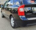 Чорний Кіа Каренс, об'ємом двигуна 2 л та пробігом 191 тис. км за 6500 $, фото 5 на Automoto.ua