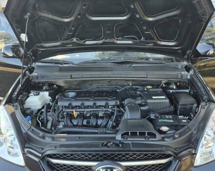 Чорний Кіа Каренс, об'ємом двигуна 2 л та пробігом 88 тис. км за 6450 $, фото 52 на Automoto.ua