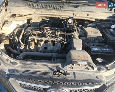 Чорний Кіа Каренс, об'ємом двигуна 2 л та пробігом 234 тис. км за 5500 $, фото 1 на Automoto.ua