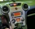 Черный Киа Каренс, объемом двигателя 2 л и пробегом 99 тыс. км за 5500 $, фото 7 на Automoto.ua