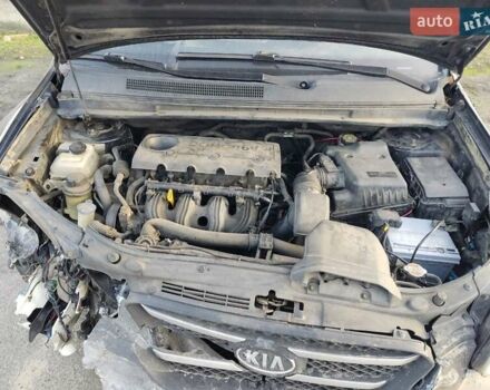 Черный Киа Каренс, объемом двигателя 2 л и пробегом 340 тыс. км за 3000 $, фото 2 на Automoto.ua