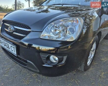 Чорний Кіа Каренс, об'ємом двигуна 2 л та пробігом 88 тис. км за 6450 $, фото 11 на Automoto.ua