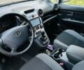 Киа Каренс 2008 в Хусте на Automoto.ua Черный Киа Каренс, объемом двигателя 2 л и пробегом 125 тыс. км за 6700 $, фото 5 на Automoto.ua