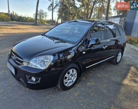 Чорний Кіа Каренс, об'ємом двигуна 2 л та пробігом 88 тис. км за 6450 $, фото 26 на Automoto.ua