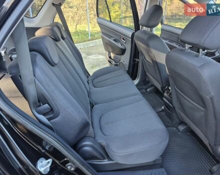 Чорний Кіа Каренс, об'ємом двигуна 2 л та пробігом 88 тис. км за 6450 $, фото 39 на Automoto.ua