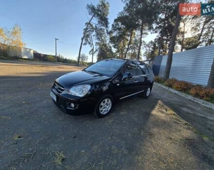 Чорний Кіа Каренс, об'ємом двигуна 2 л та пробігом 88 тис. км за 6450 $, фото 27 на Automoto.ua