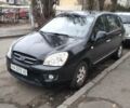 Чорний Кіа Каренс, об'ємом двигуна 2 л та пробігом 224 тис. км за 6400 $, фото 1 на Automoto.ua