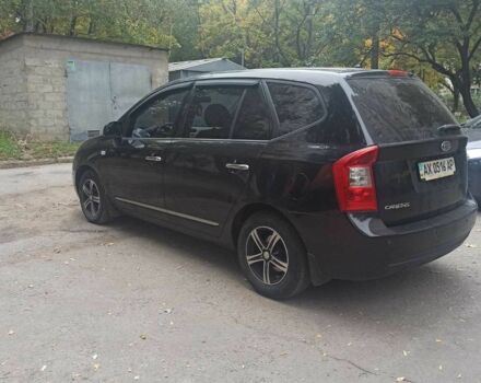 Черный Киа Каренс, объемом двигателя 0 л и пробегом 213 тыс. км за 6441 $, фото 1 на Automoto.ua