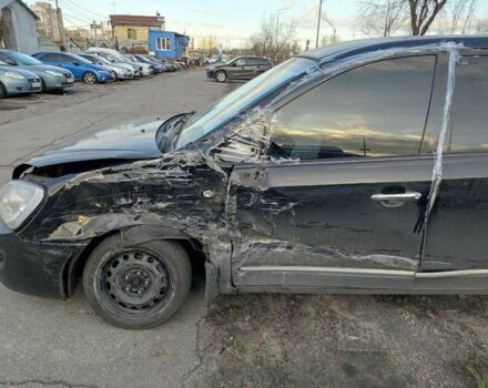 Черный Киа Каренс, объемом двигателя 1.98 л и пробегом 340 тыс. км за 3000 $, фото 10 на Automoto.ua